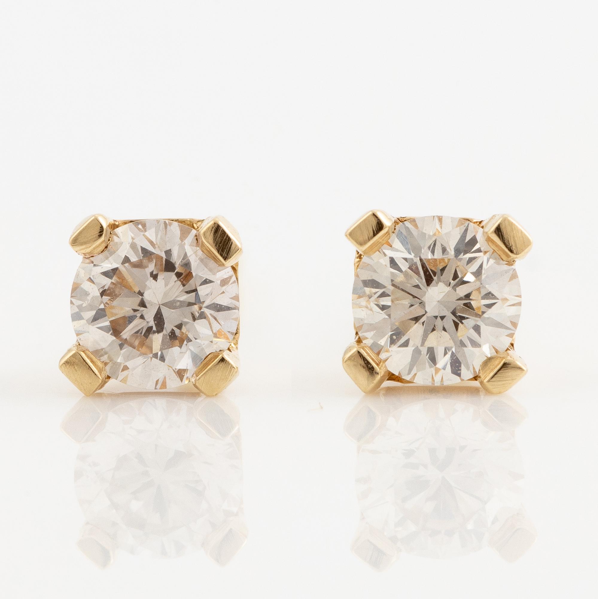 Earrings 14K gold with brilliant-cut diamonds.