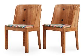 A pair of Axel Einar Hjorth 'Lovö' stained pine armchairs, Nordiska Kompaniet, 1930's.