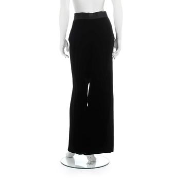 CHANEL, a pair of black velvet pants.