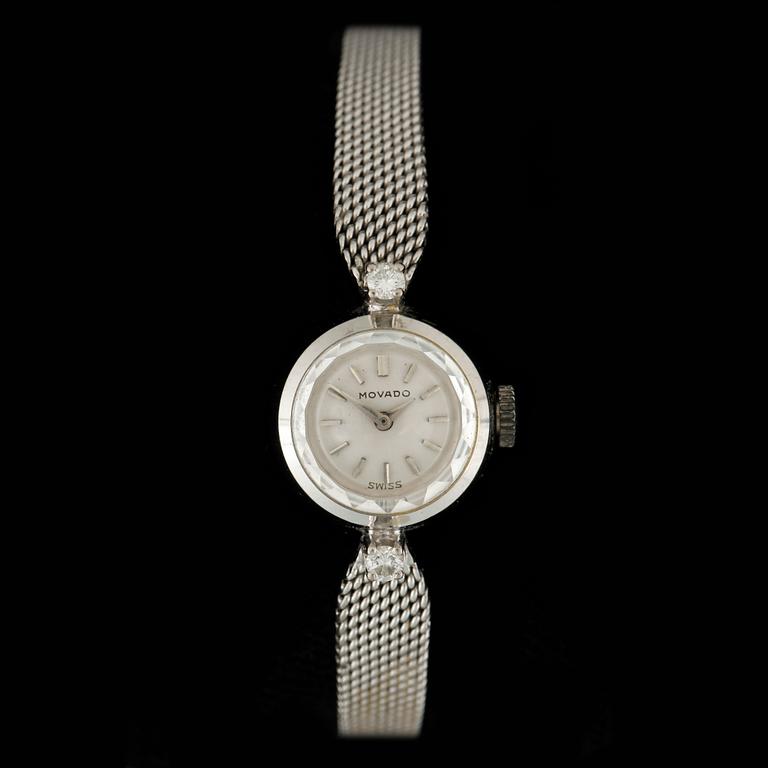 DAMARMBANDSUR, vitguld 18k, två små briljantslipade diamanter, Movado. Vikt ca 22 gram.