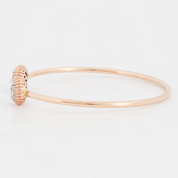 An 18K rose gold bracelet set with round brilliant-cut diamonds.