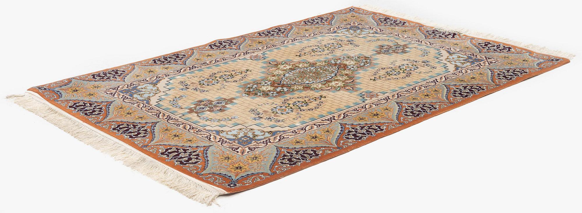 A part silk Isfahan rug, Central Persia (Iran), signed 163 x 108 cm.