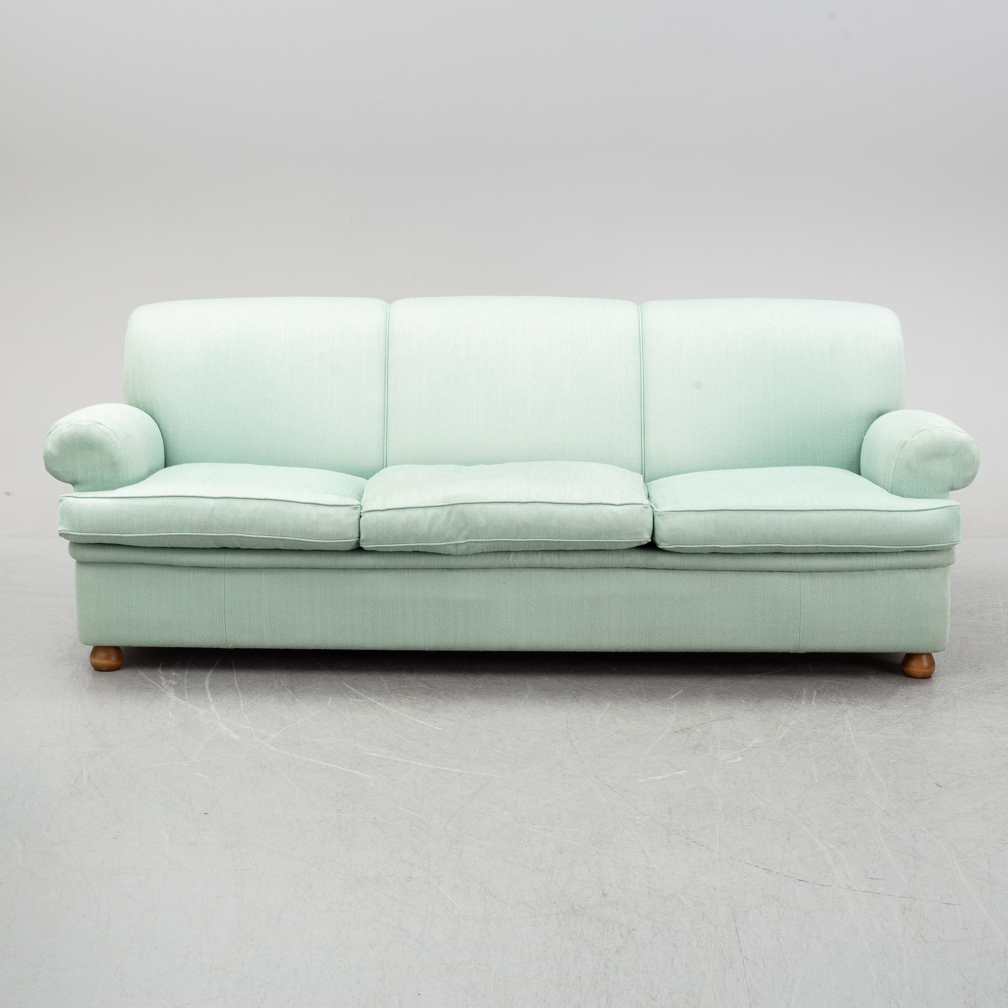 A model 703 sofa by Josef Frank for Firma Svenskt Tenn.
