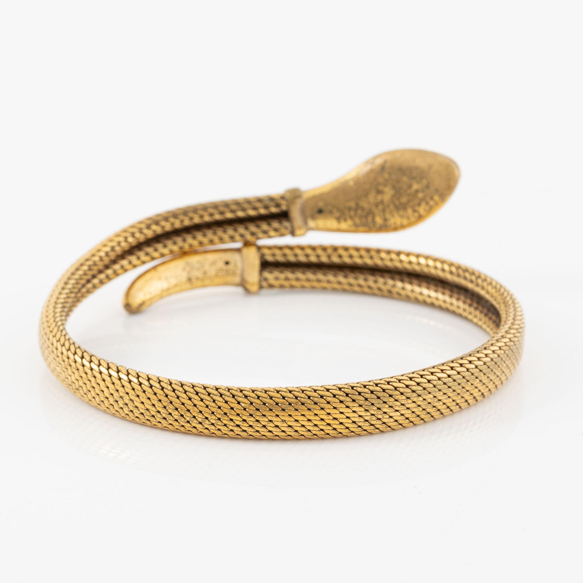 Arm ring, in the form of a serpent, brass.