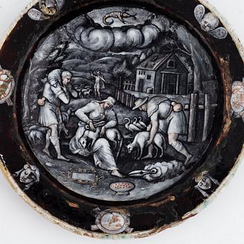 A Limoges grisaille enamel plate representing the month of June in the manner of Jean Miette, 16th/17th century.