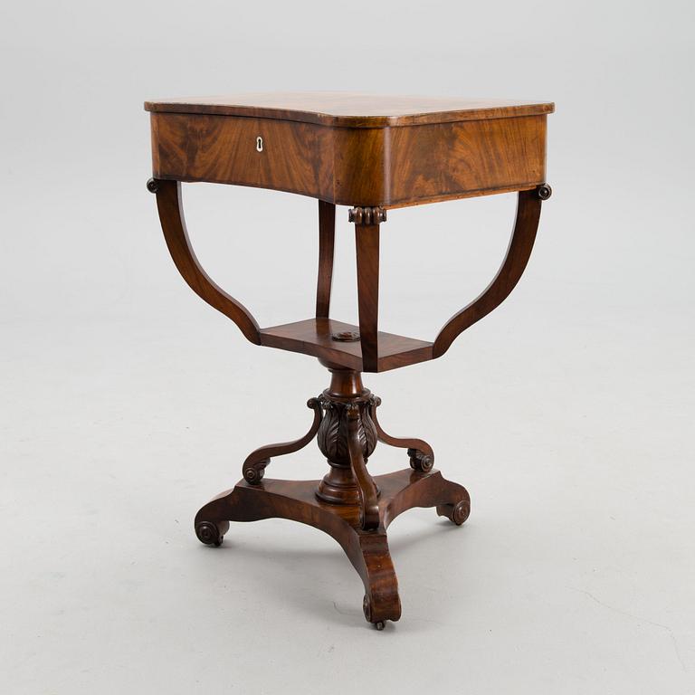 A sewing table from the first half of the 19th century.