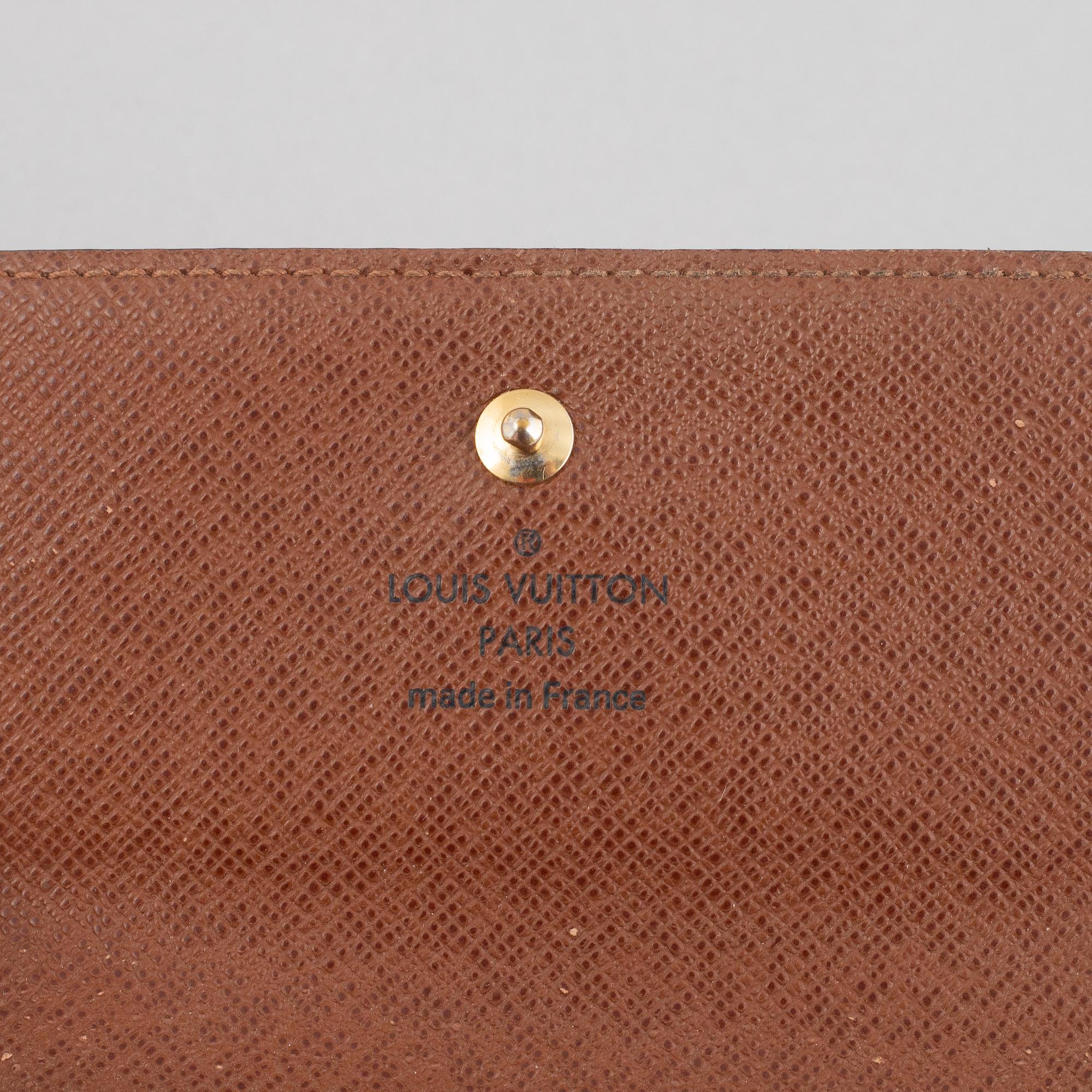 Louis Vuitton, plånbok och kalender.