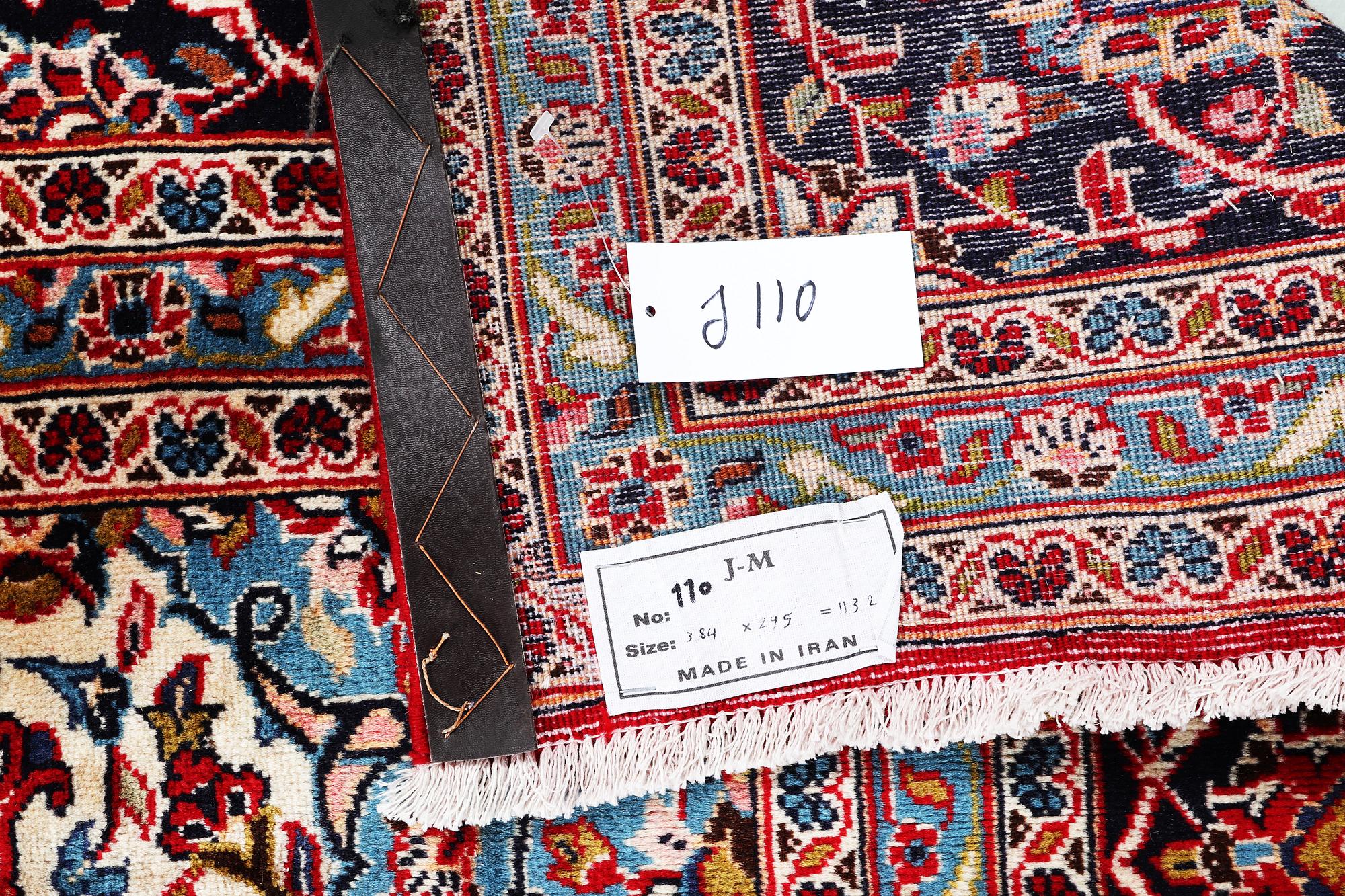 A carpet, Kashan, ca 384 x 295 cm.