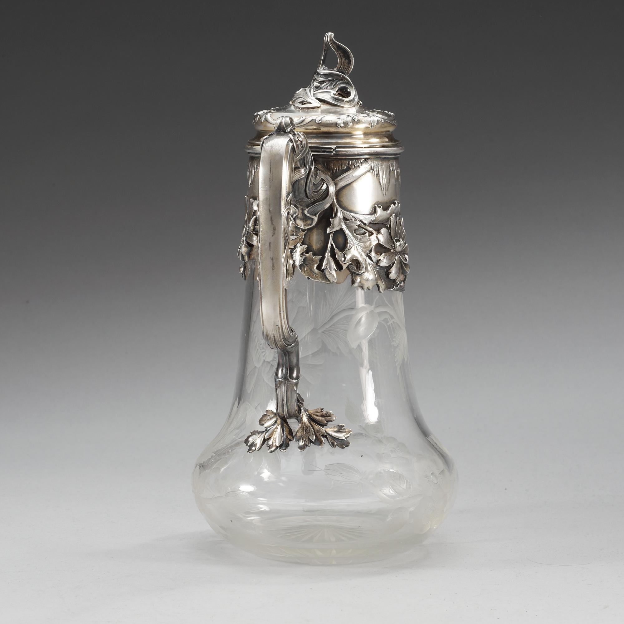 A Russian 20th century glass and parcel- gilt jug.
