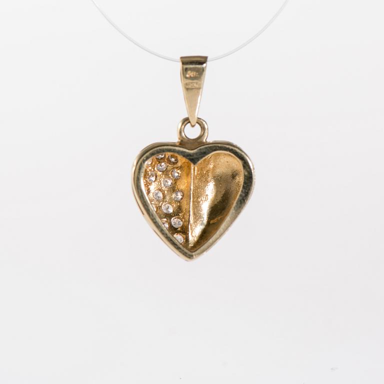 HÄNGE, 14K guld, 16 små diamanter. Vikt 2,6 g.