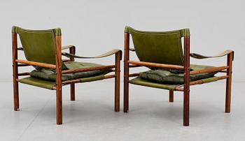 FÅTÖLJER OCH MELLANBORD, ett par. "Sirocco", Arne Norell, modellen formgiven 1964.