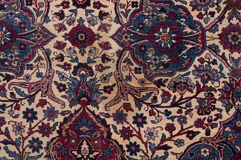 An oriental carpet, approx. 411 x 326 cm.