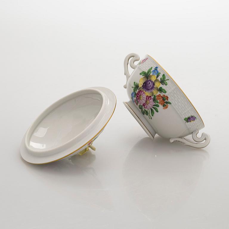 A pair of Herend porcelain candlesticks, and a lidded sugar bowl, Hungary.
