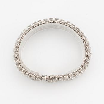 A platinum bracelet set with round brilliant-cut diamonds.