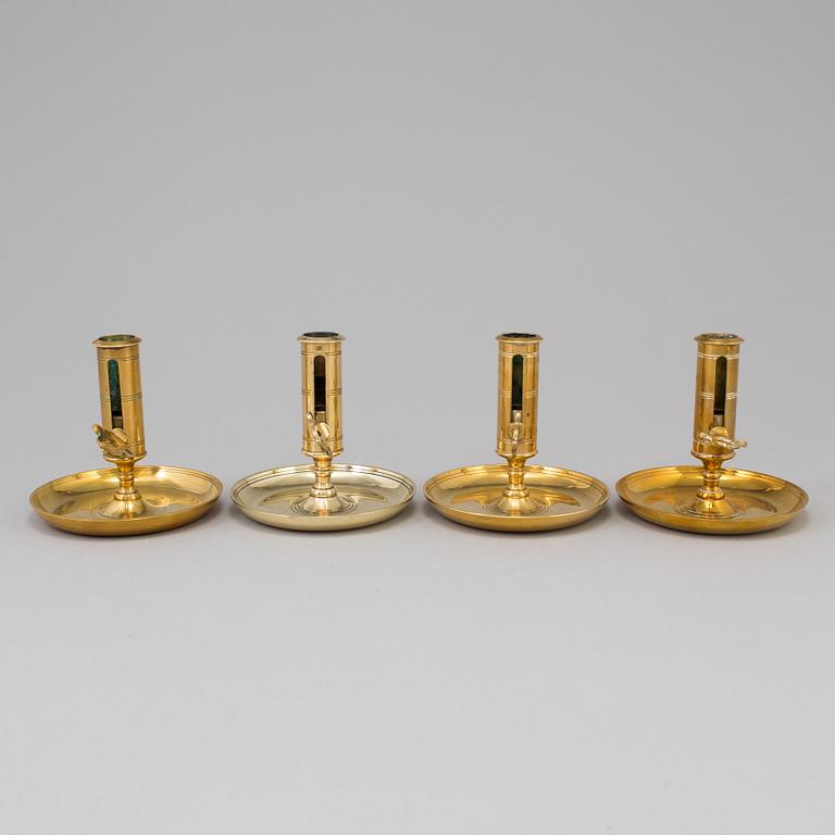 Four brass candlesticks from Skultuna and Svenska Metallverken, second half of the 20th Century.