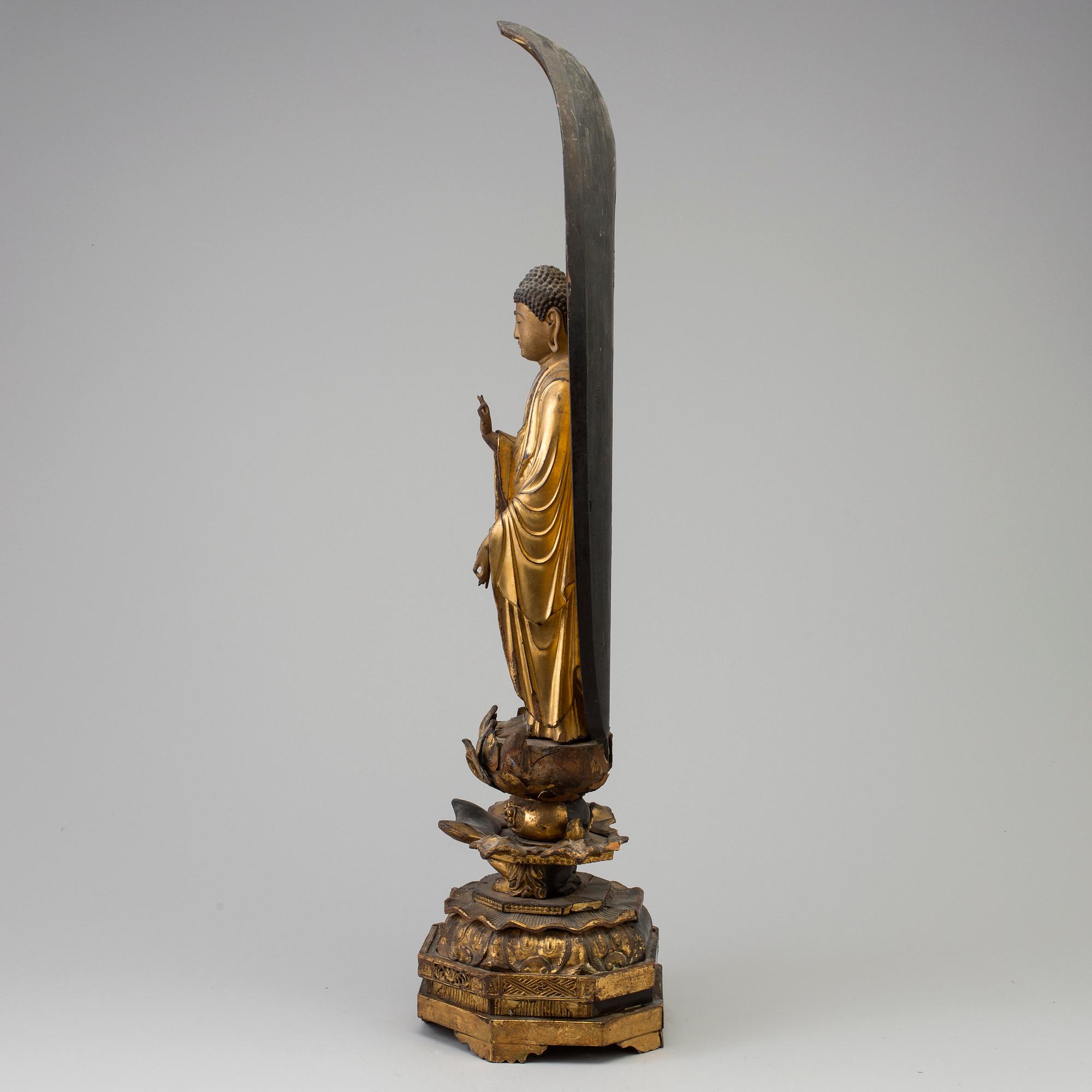 A large wooden lacquered figure of buddha, Japan, 19th Century.