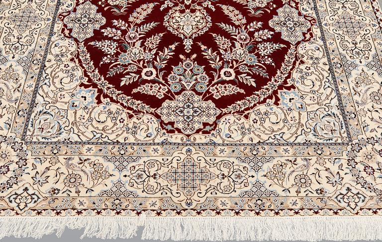 A carpet, Figural Nain, Part silk, S.K 6LAA, 239 x 155 cm.