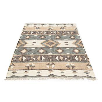 An Indian flat weave carpet,  approx. 287 x 174 cm.