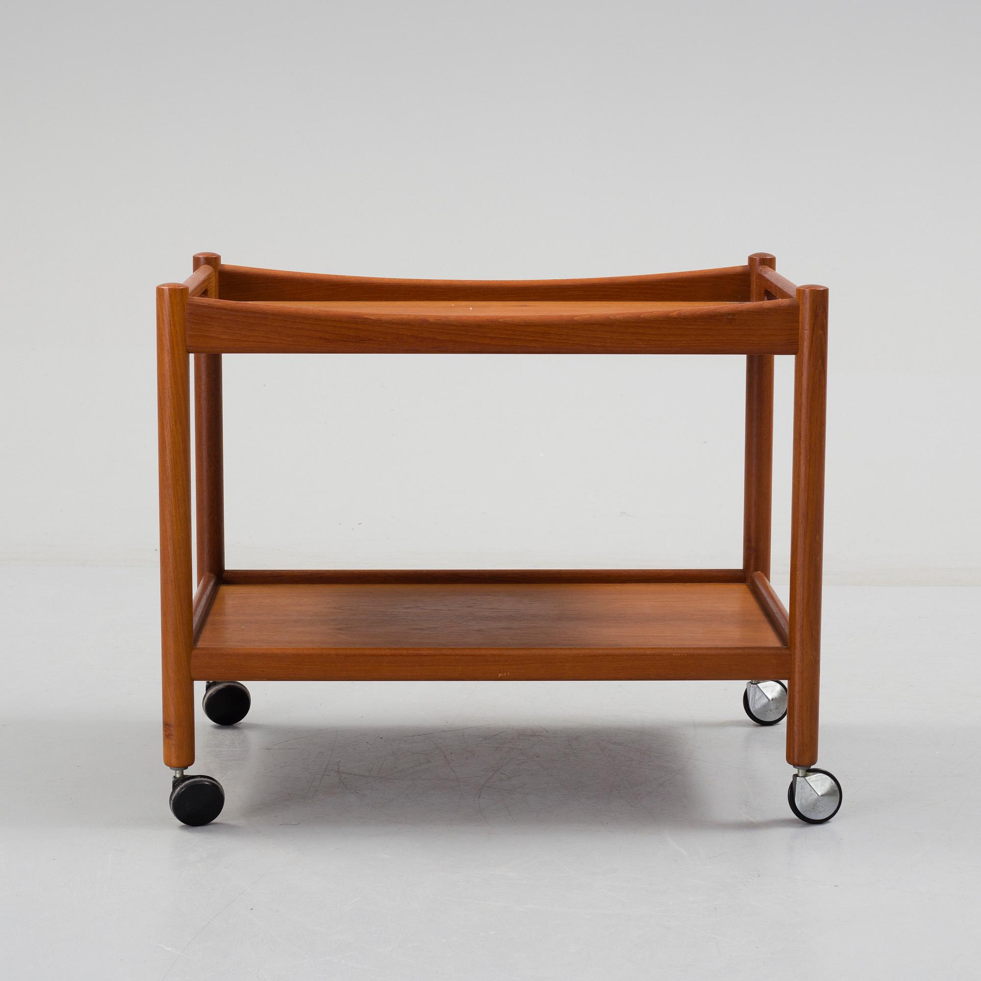 A Hans J Wegner serving trolley veneered with teak.