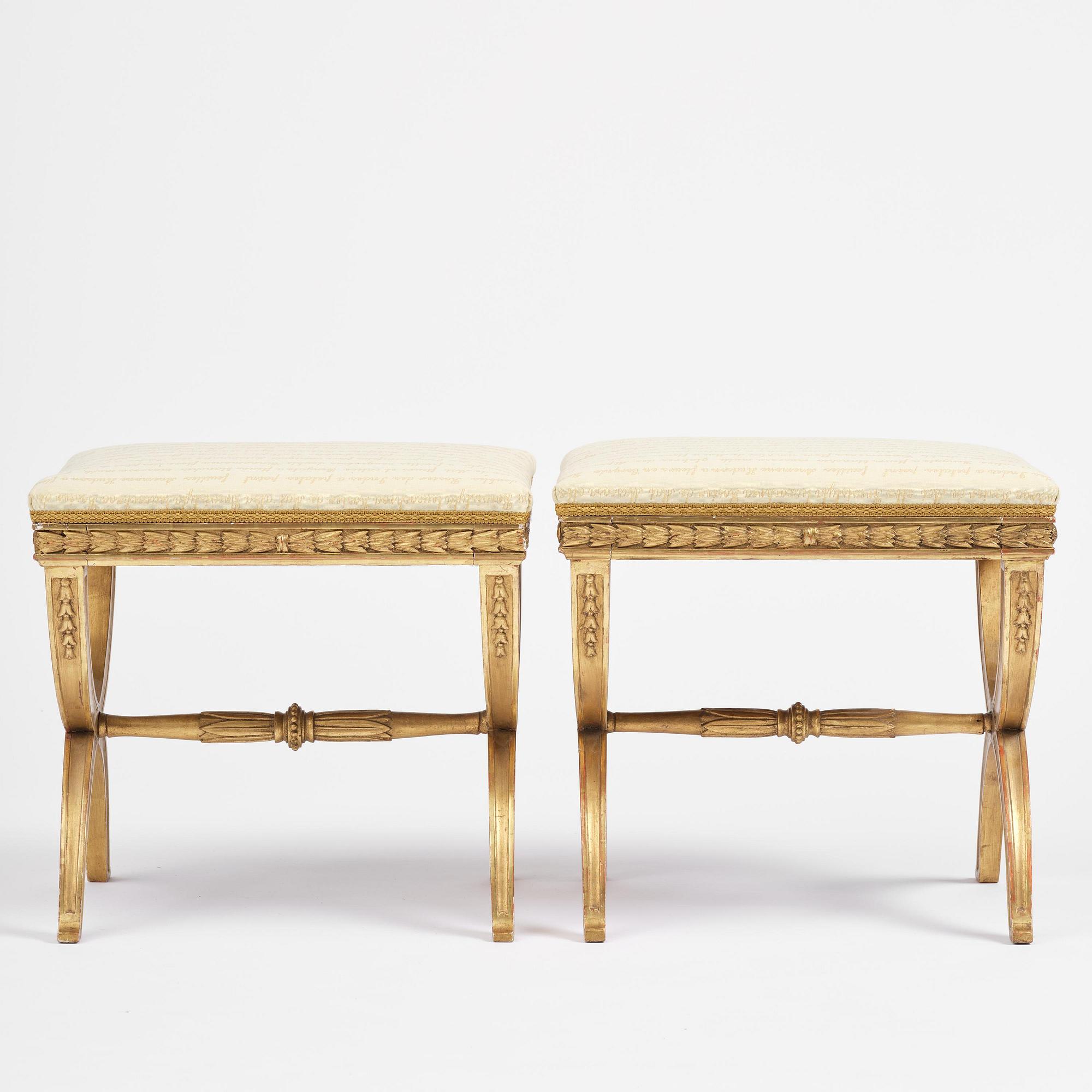 A pair of late Gustavian giltwood stools, Stockholm, late 18th century.
