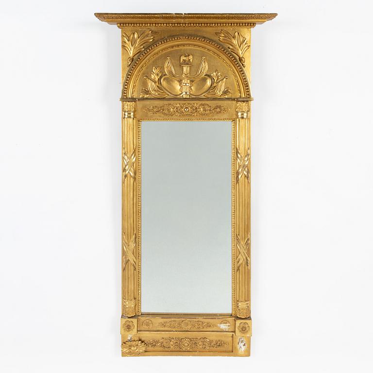 An Empire mirror, first half of the 19th Century.