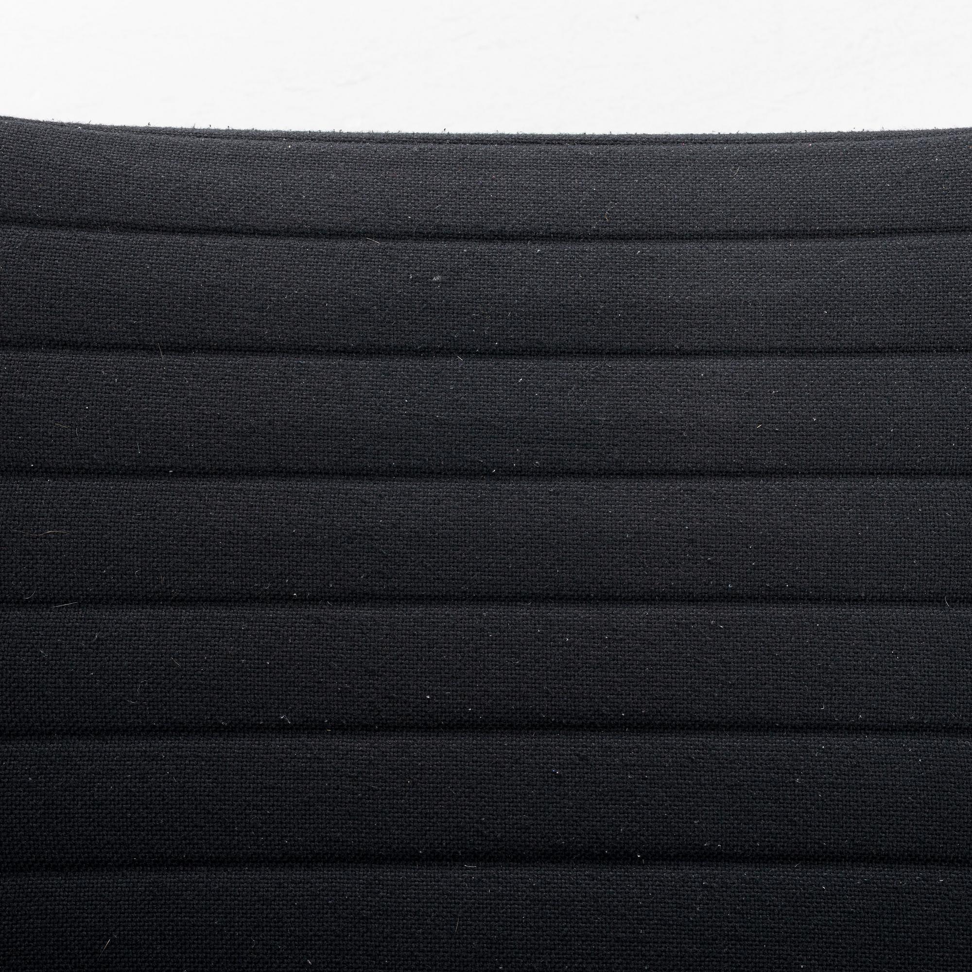 Charles & Ray Eames, a model 'EA 108' armchair, Vitra, 2006.