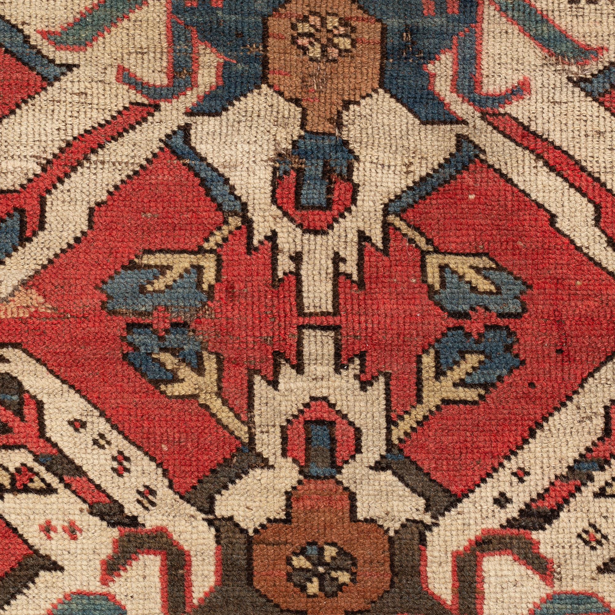 A rug, Antique so called "Sunburst Karabagh" or "Eagle Kazak", ca 174 x 138 cm.