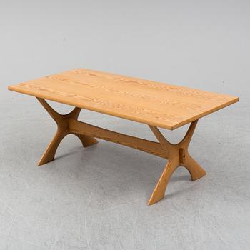 A 1960/70's pine sofa, armchair and coffee table.