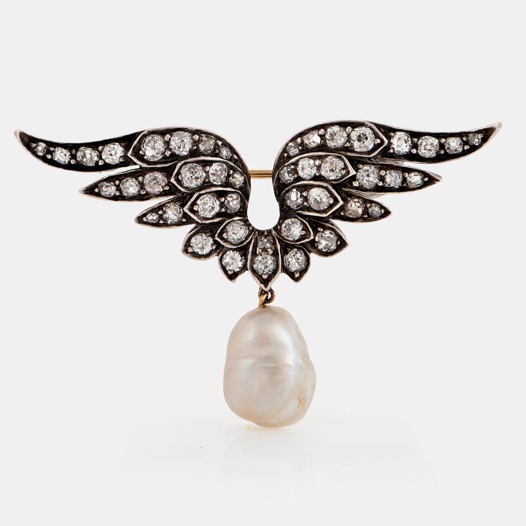 A silver and 14K gold brooch set with old-cut diamonds and a drop shaped pearl.
