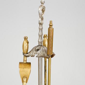 ELDSTÄLL. Gjutjärn, kromad metall och mässing, 1900-talets första hälft.