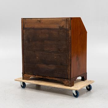 A mahogany veneered secretaire, early 19th Century.