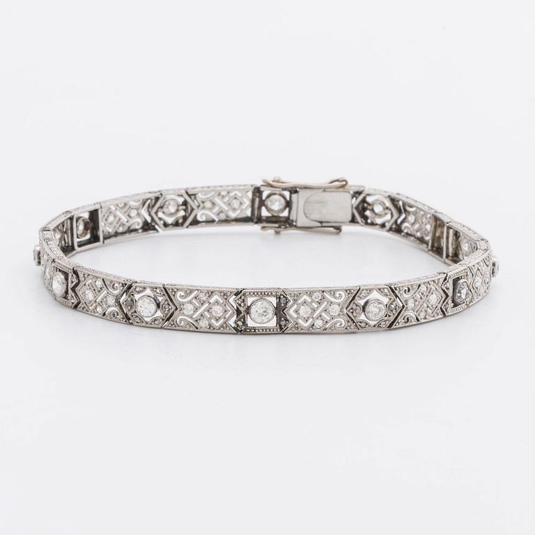 DIAMOND BRACELET, probably platinum, old and rose-cut diamonds approx 2 ct in total, 1 large stone not diamond.