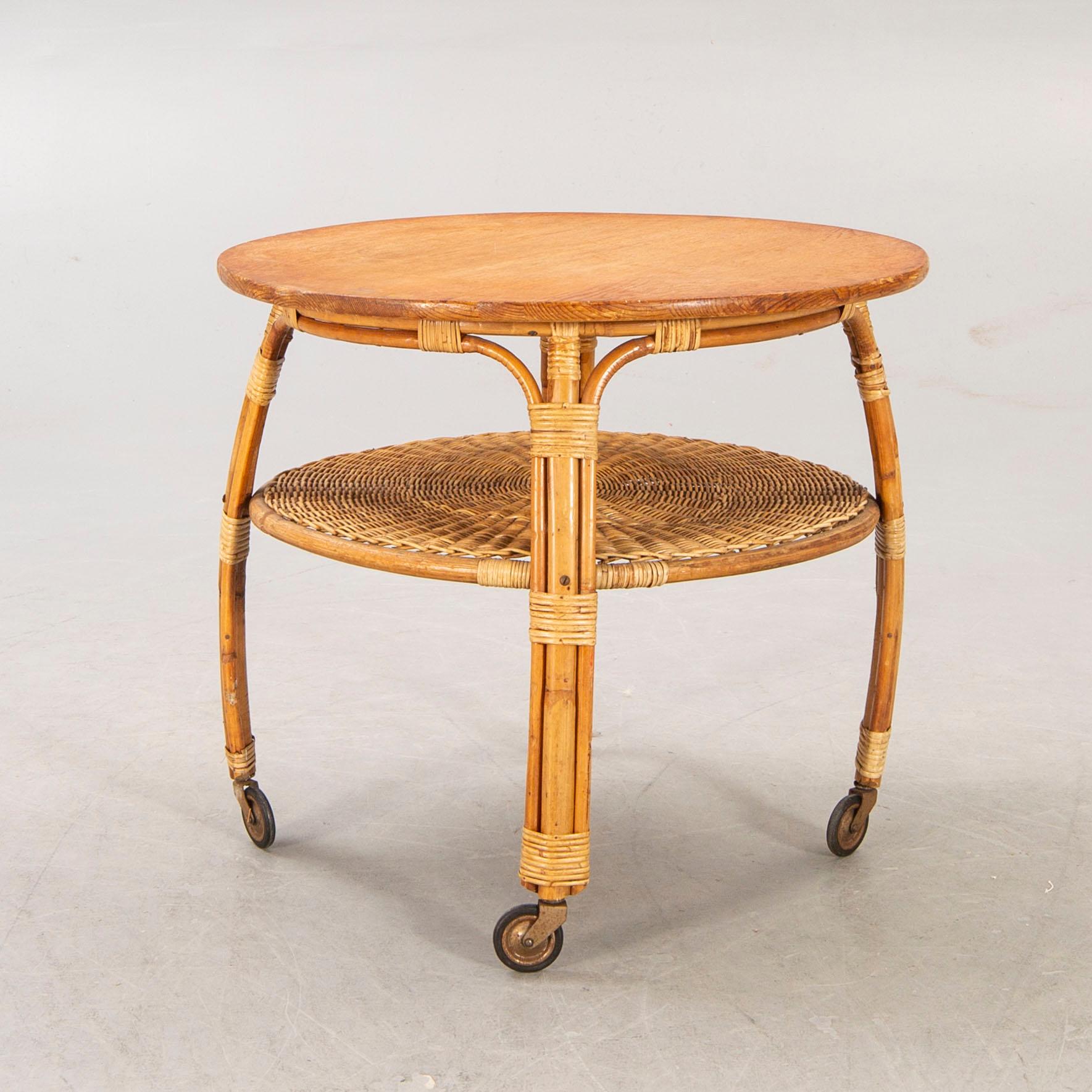 Armchairs a pair and table, 1930s-40s.