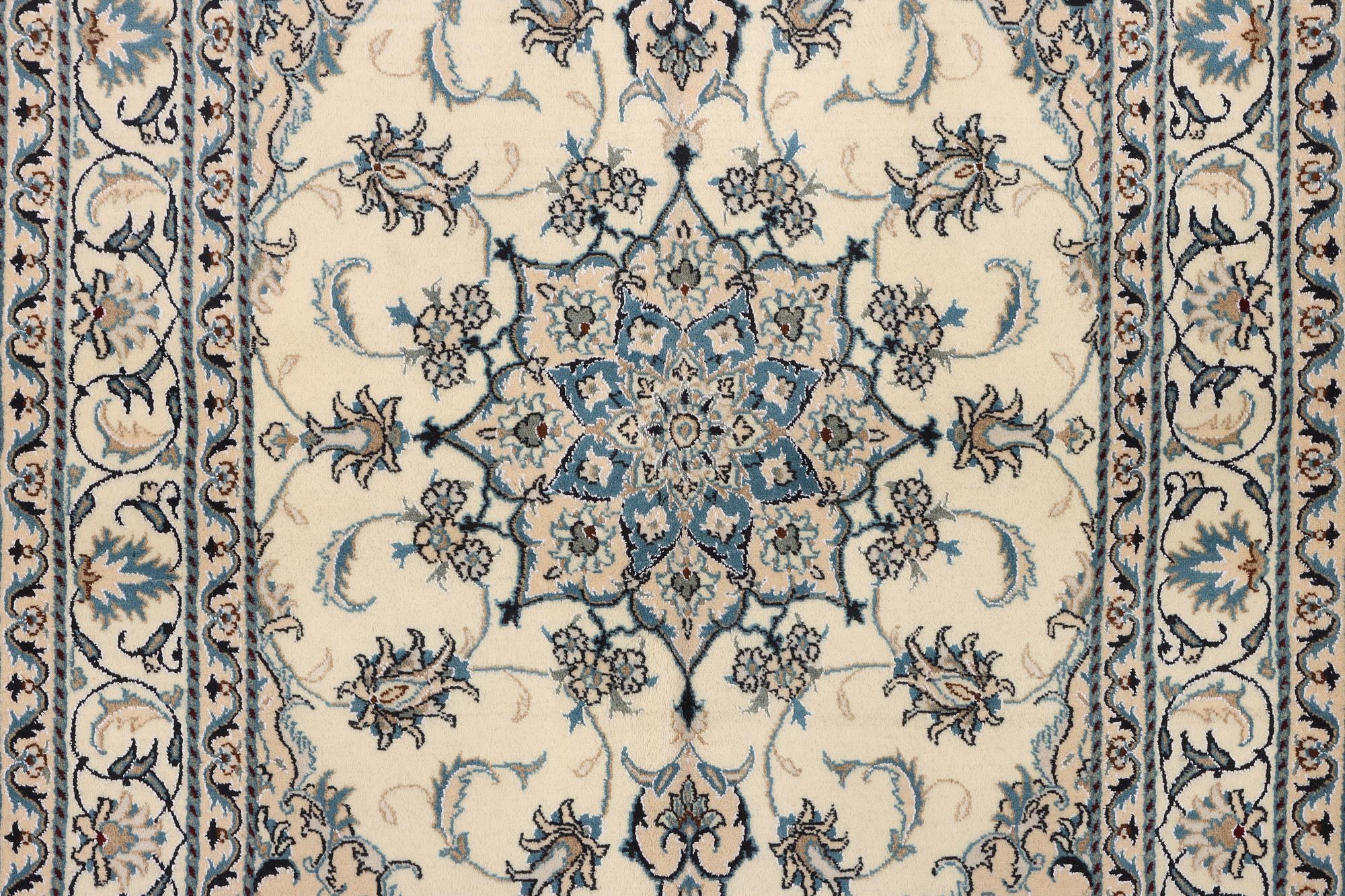 A Nain part silk rug, c. 193 x 148 cm.