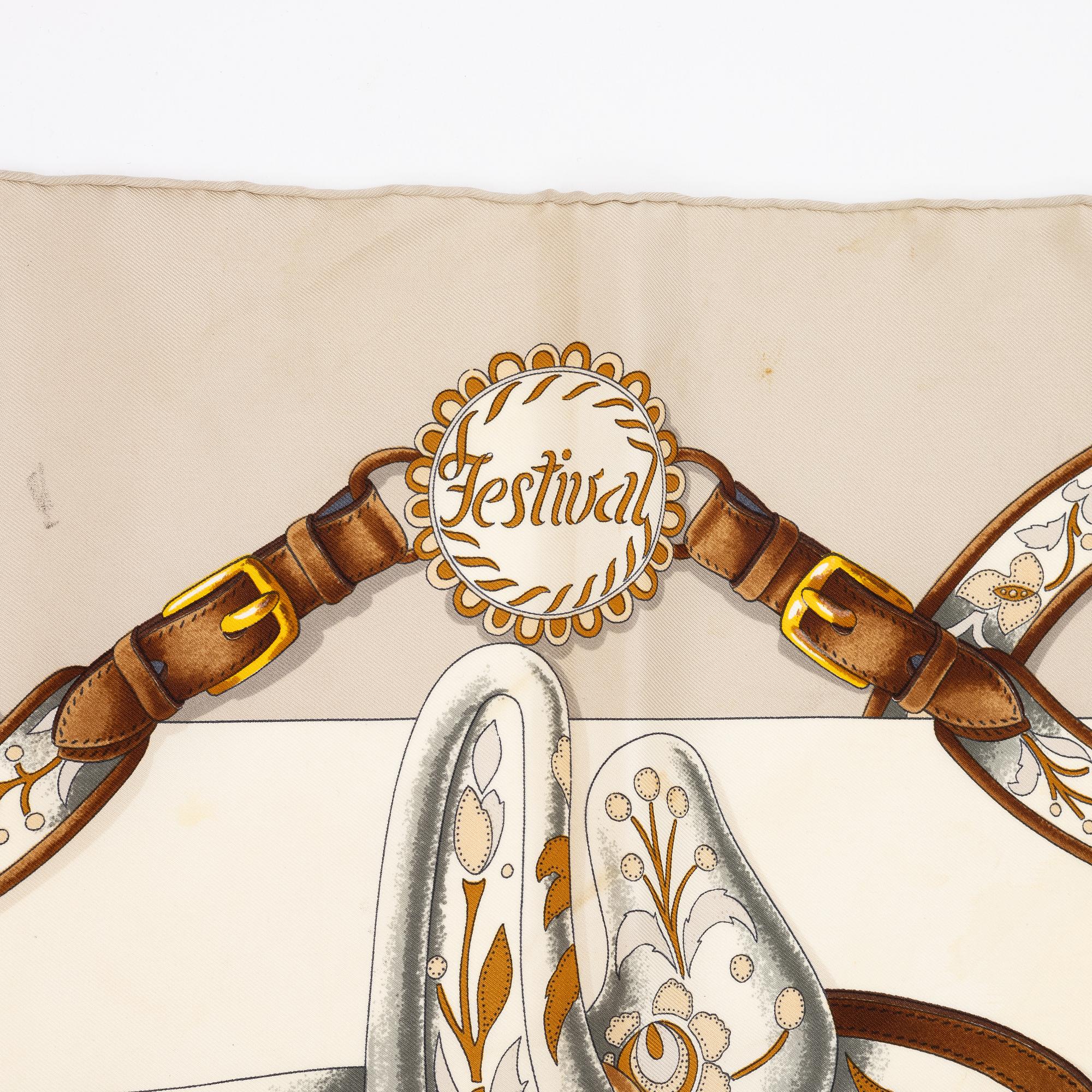 Hermès, a 'Festival' silk scarf.