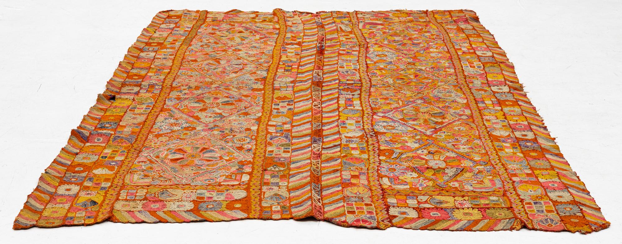 A semi-antique embroided textile, nomads, Iraq, c. 240 x 152 cm.