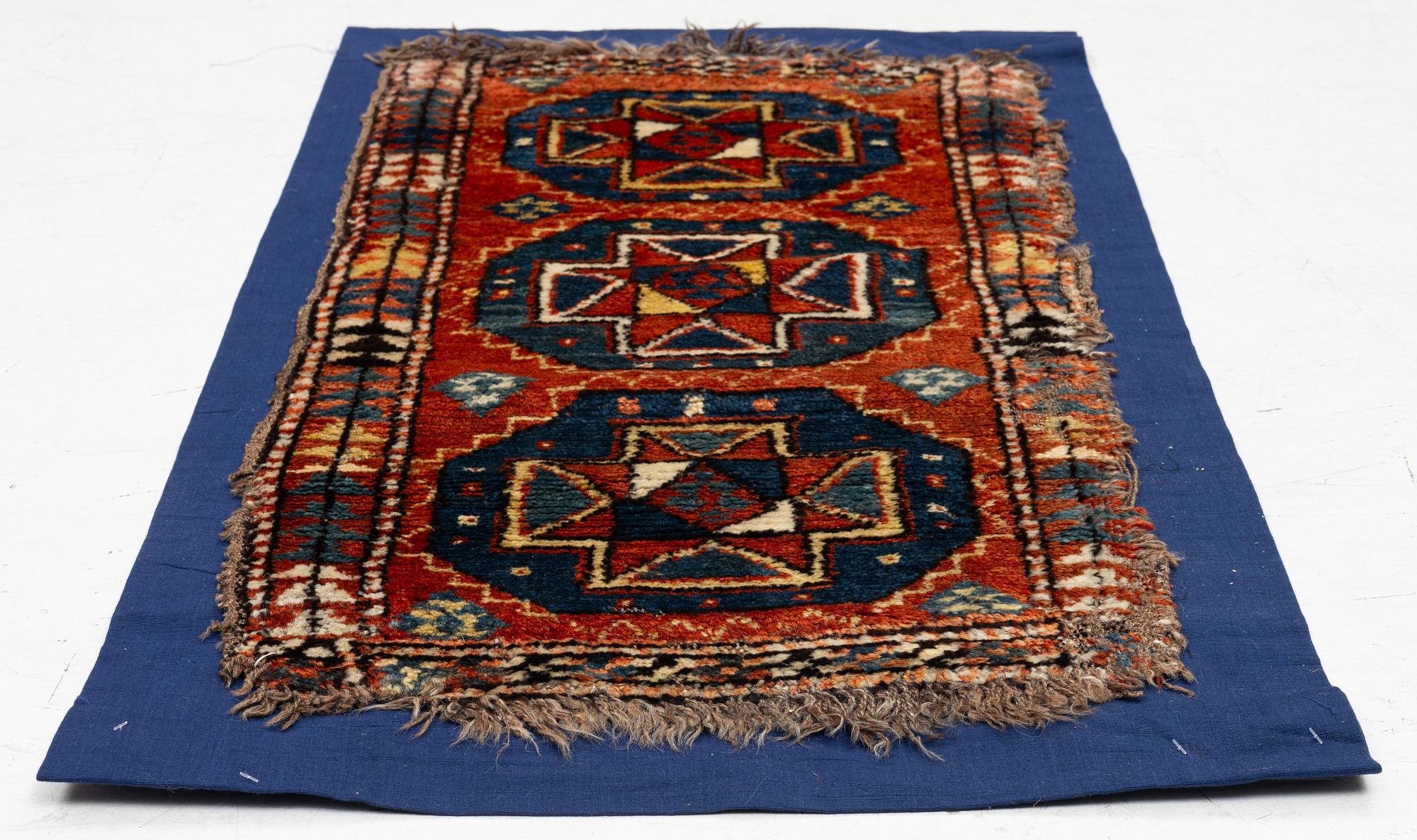 An antique Yastik rug, possibly Afghanistan, c. 110 x 57.