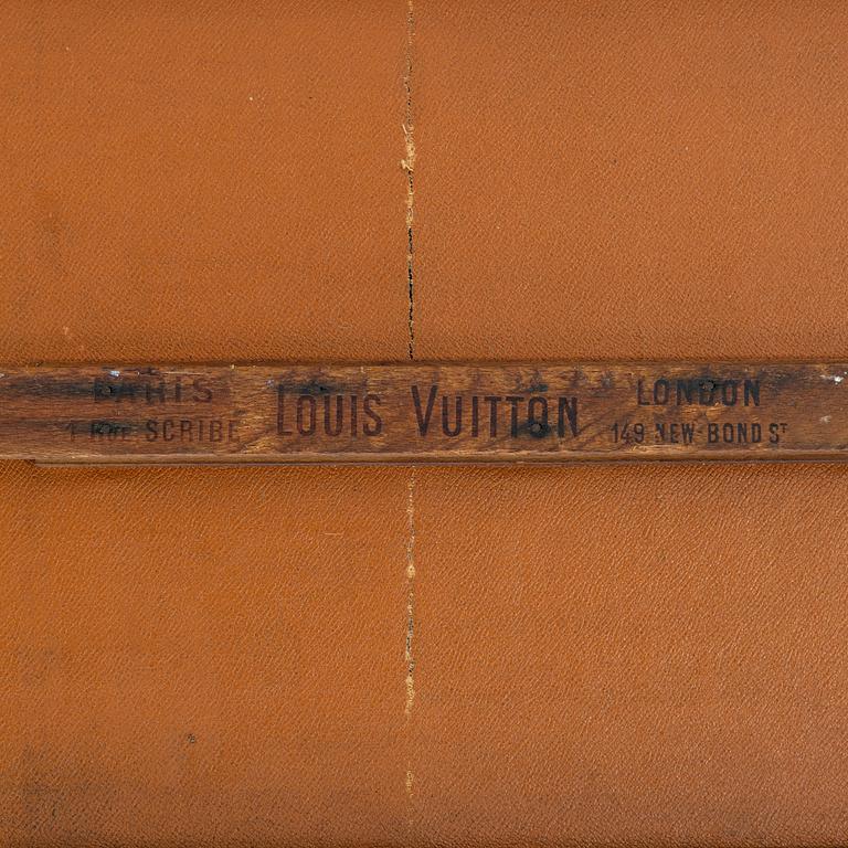 Louis Vuitton, orange Steem Trunk from the early 20th century.