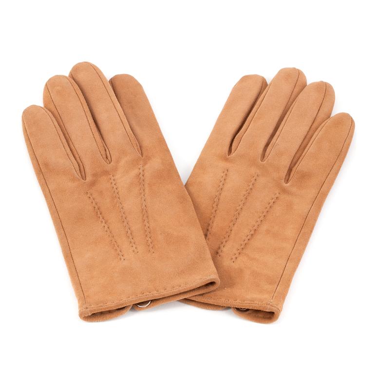 HERMÉS, a pair of beige suede gloves, size 7 1/2.