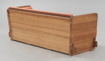 An Axel Einar Hjorth stained pine sofa 'Lovö'. Nordiska Kompaniet Sweden 1930's.
