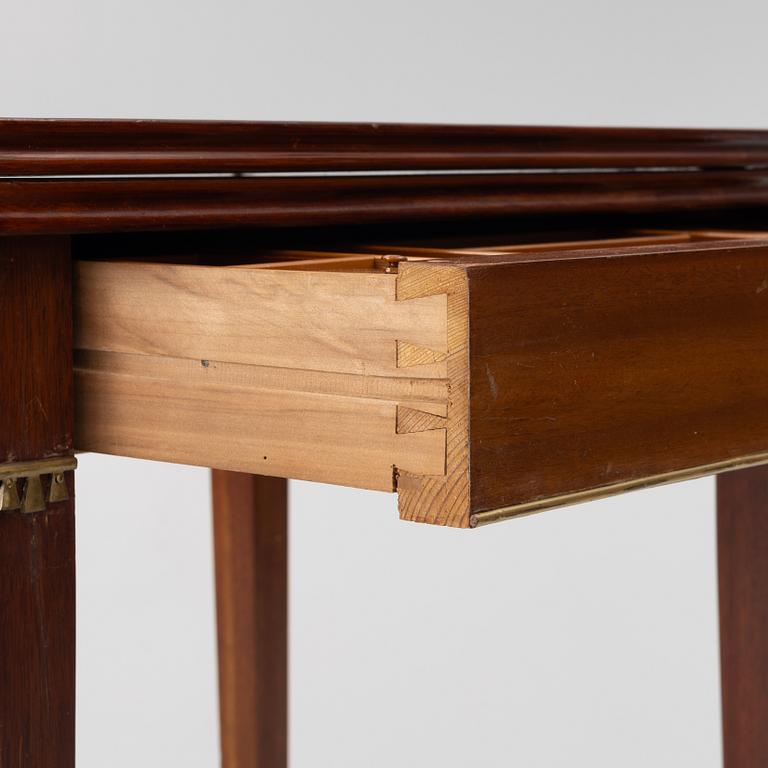 A late Gustavian style games table/sewing table, early 20th century.