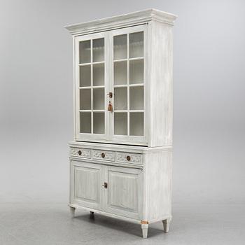 A vitrine cabinet, 19th century.