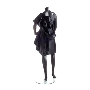 CHRISTIAN LACROIX, a black cocktail dress.