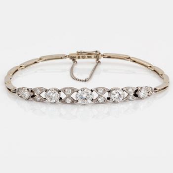 A bracelet in 18K gold and white gold set with old- and eight-cut diamonds with a total weight of ca 1.70 cts.