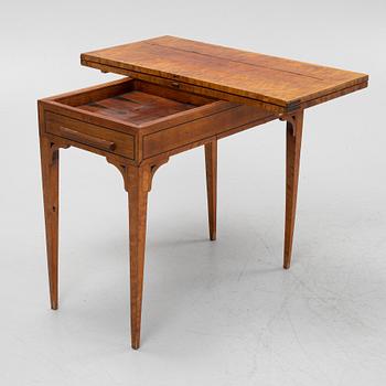 A birch card table, 19th Century.