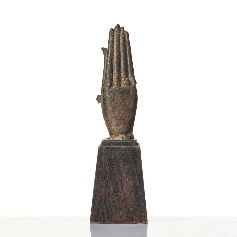 A bronze sculpture of buddhas hand, Thailand, 17th century.