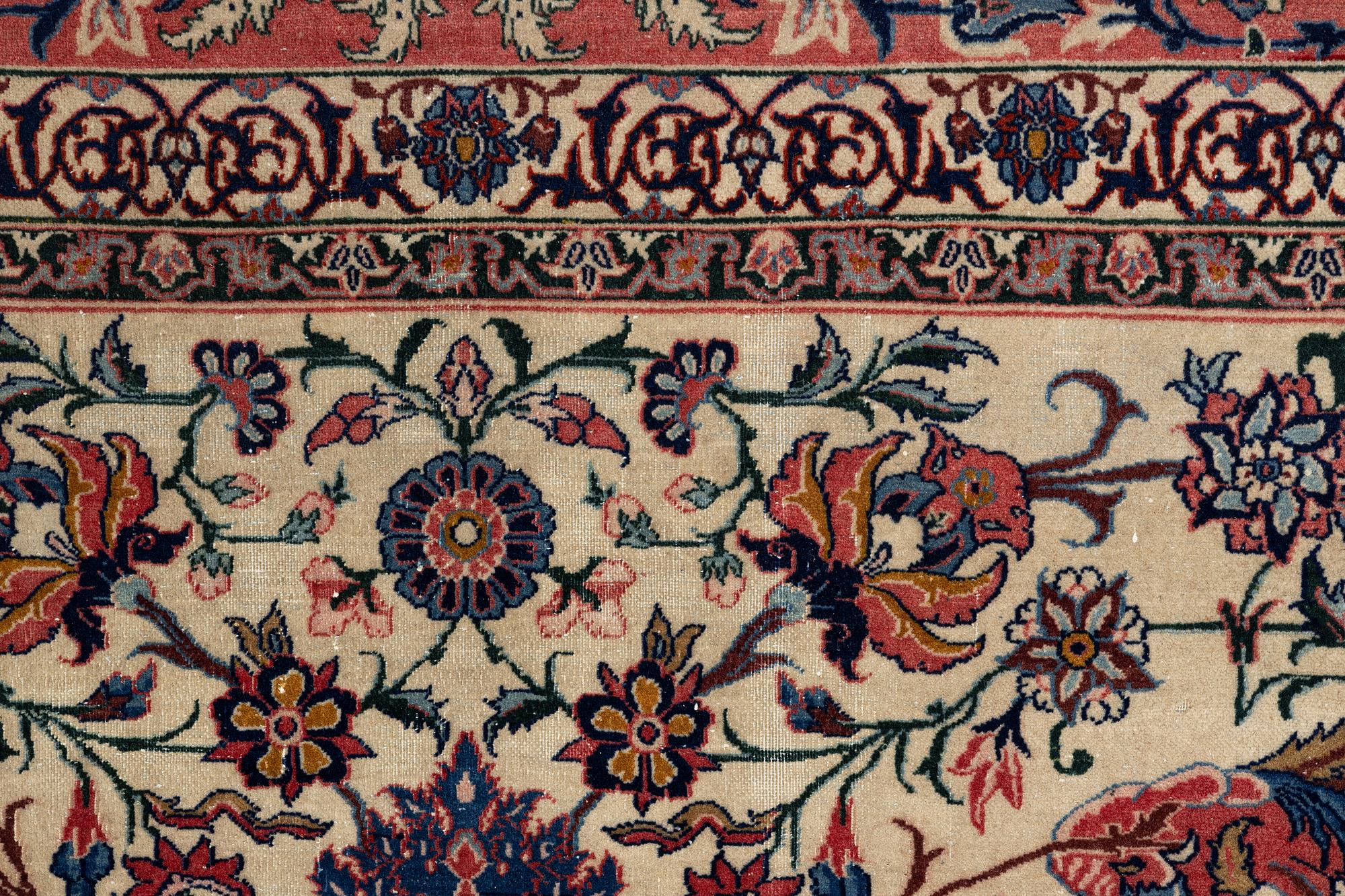 A semi-antique Isfahan carpet, central Iran, c. 325 x 210 cm.