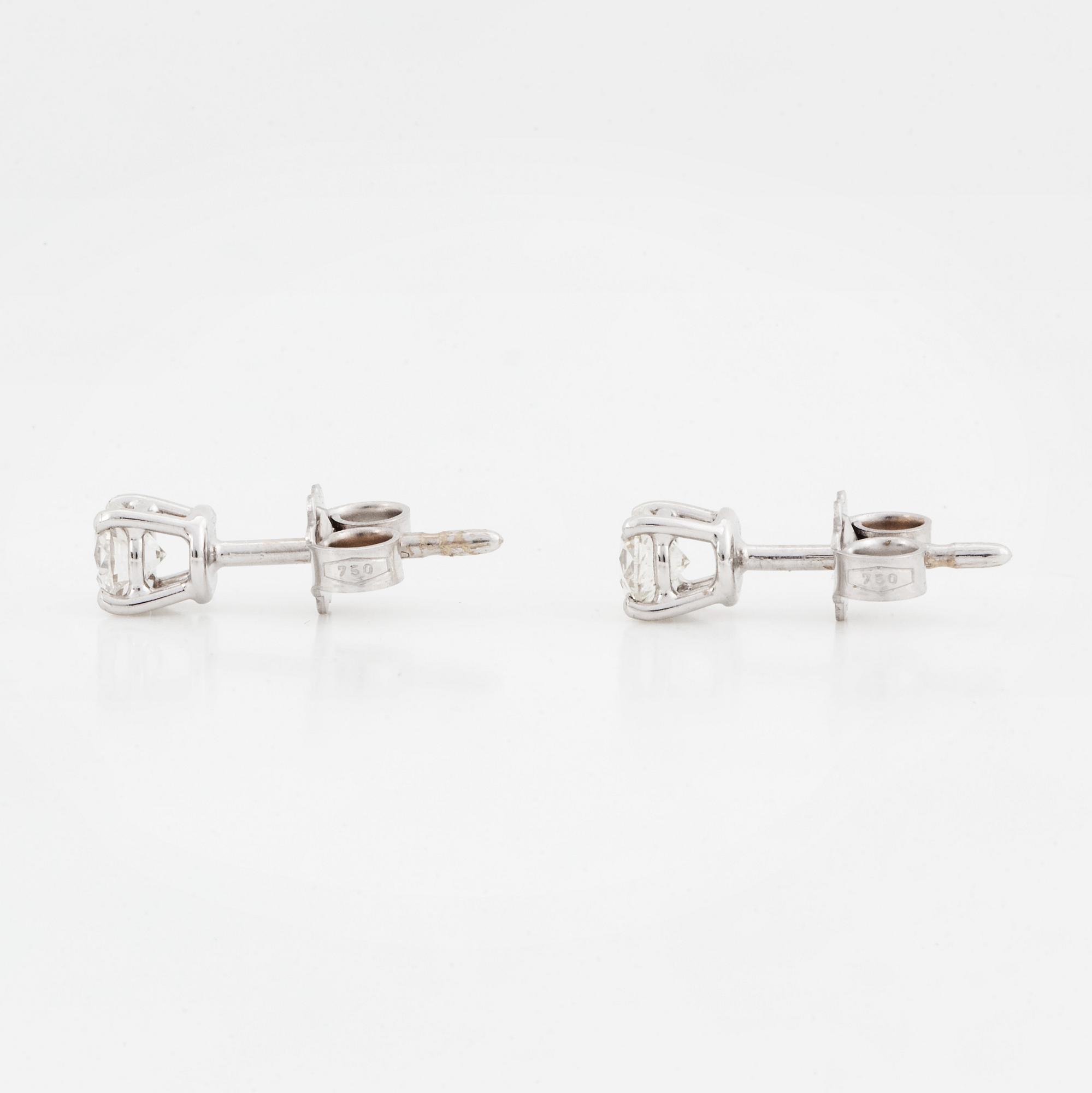 Brilliant-cut diamond earrings.