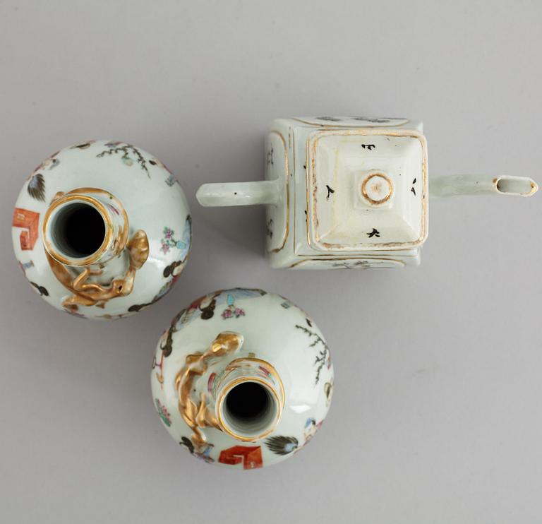 A pair of famille rose vases, and a tea pot, Qing dynasty, 19th Century and circa 1900.