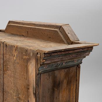 A folk-art cabinet attributed to  "Gammelmålaren" Anders Nilsson (Brunskog, 1807–1889).